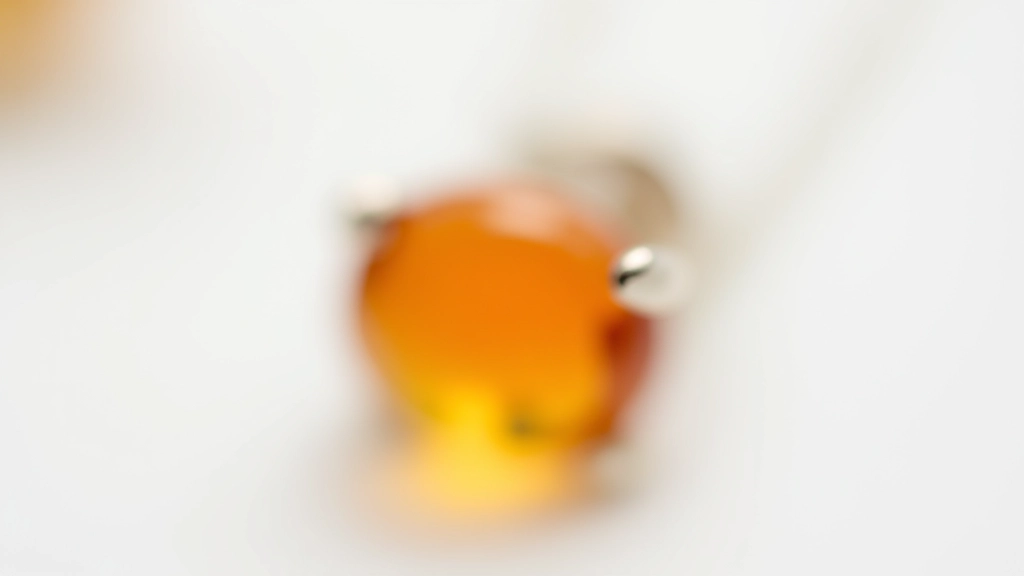 Prong setting showing amber stone held by four silver prongs bent inward at the top